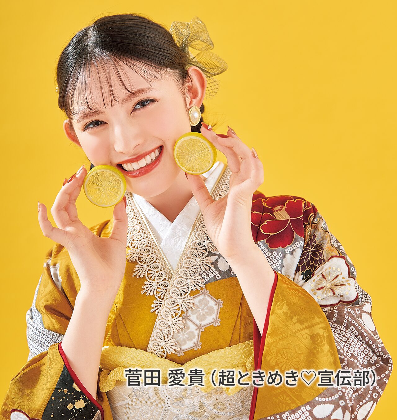 緑色の振袖を着た女性