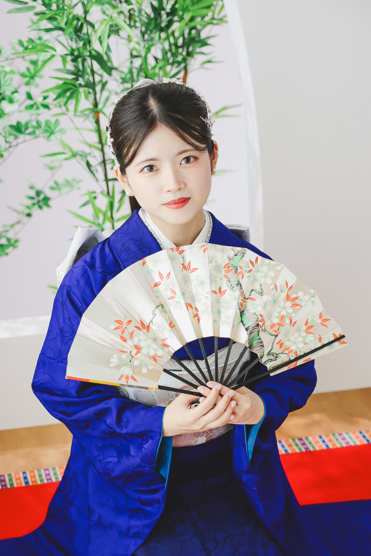 青い振袖を着たお嬢様